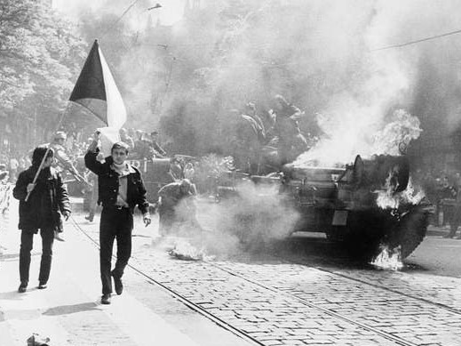 During the Soviet invasion, Czechoslovaks carry their national flag in Prague. Photo from the CIA Analysis of the Warsaw Pact Forces: The Importance of Clandestine Reporting.