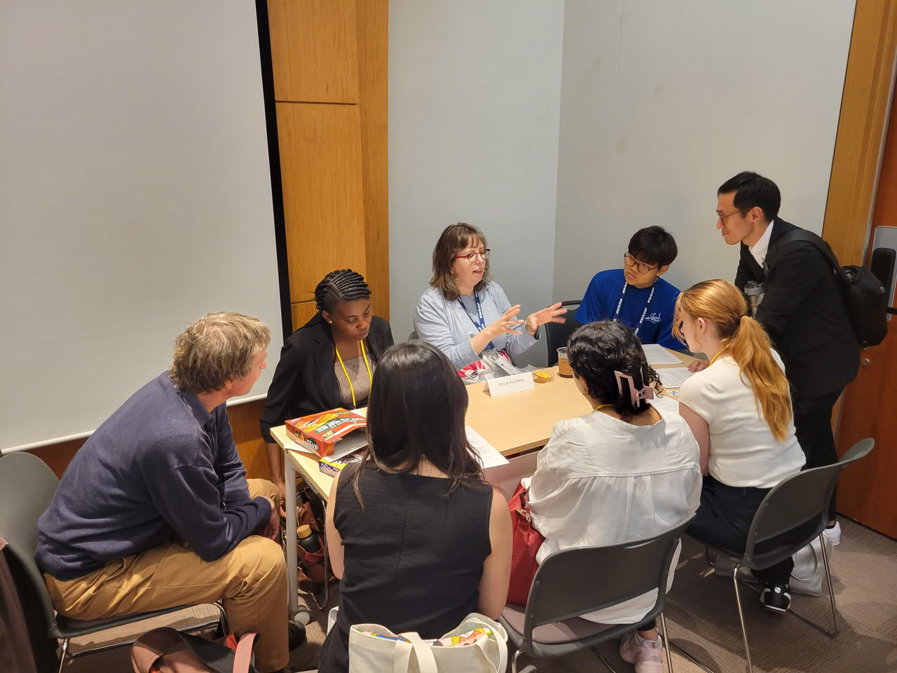 IPSA Executive Committee member Emilia Palonen with event participants.
