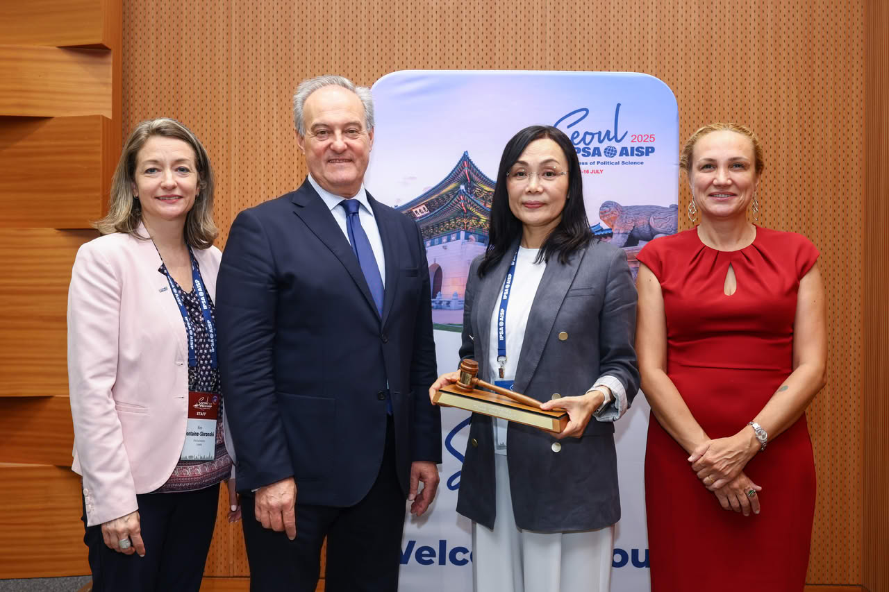 Photo (left to right): Kim Fontaine-Skronski (IPSA Executive Director), Pablo Oñate  (IPSA Past President), Yuko Kasuya (IPSA President) and Hasret Dikici Bilgin (IPSA President-Elect).
