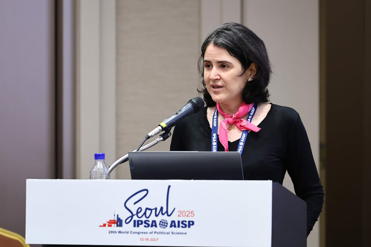 Zaynab El Bernoussi, recipient of the 2025 Global South Award, delivers her award lecture.
