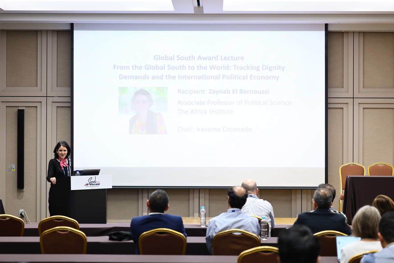 Zaynab El Bernoussi, recipient of the 2025 Global South Award, delivers her award lecture.
